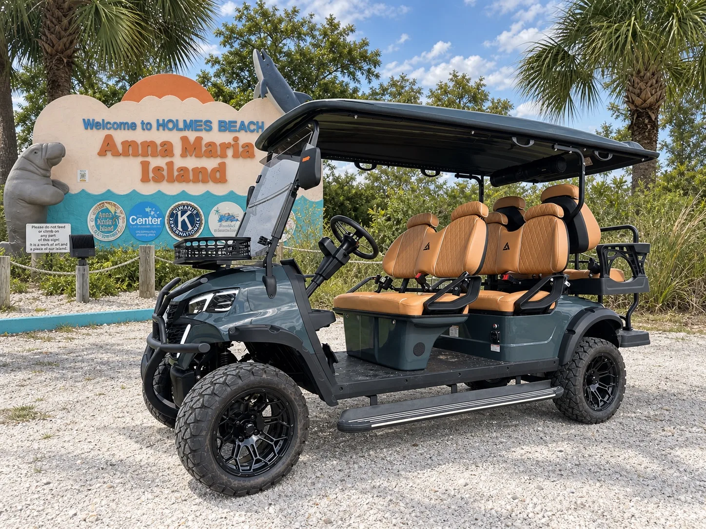 Green Premium six-seat golf cart with tan diamond-pattern upholstery
